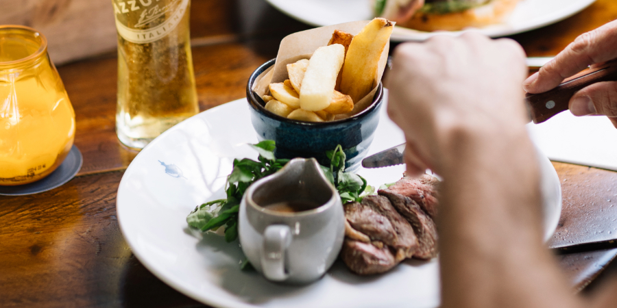 Steak with a side of chips at The Chapter Collection