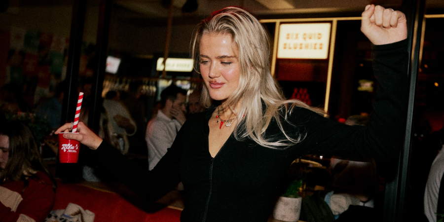 Girl dancing at Rita's