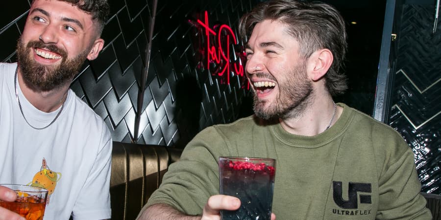 Friends enjoying cocktails at Be At One Brighton