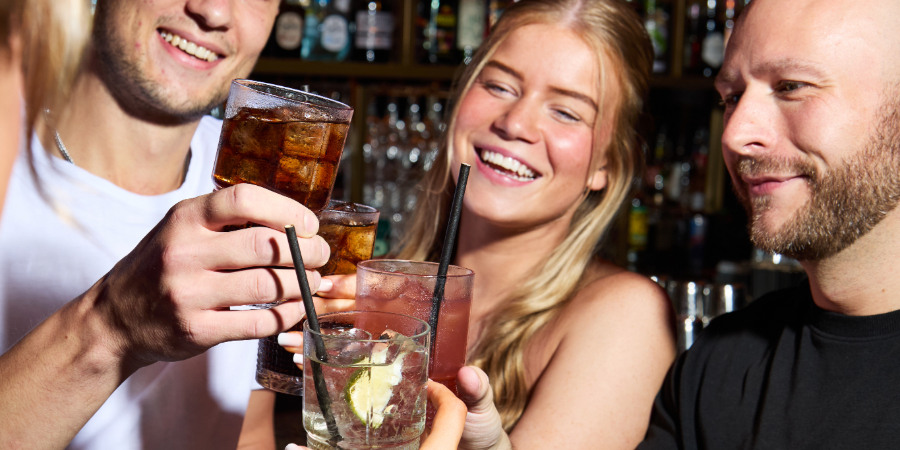 Group enjoying happy hour at Be At One