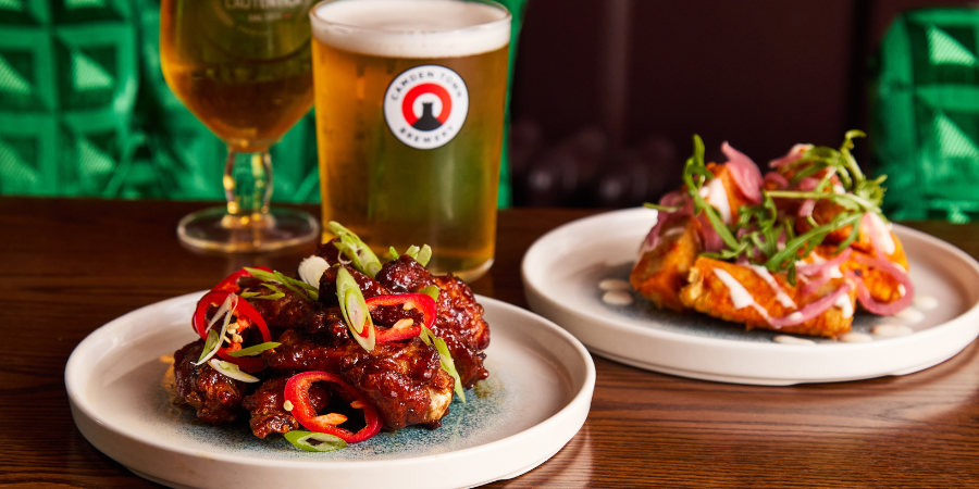 3 plates of hot wings and strips