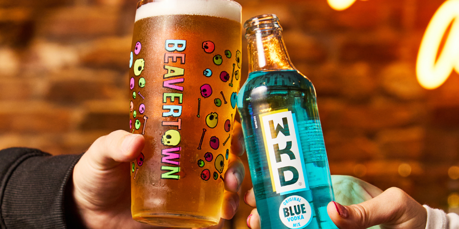 Pint of beavertown beer and blue wkd