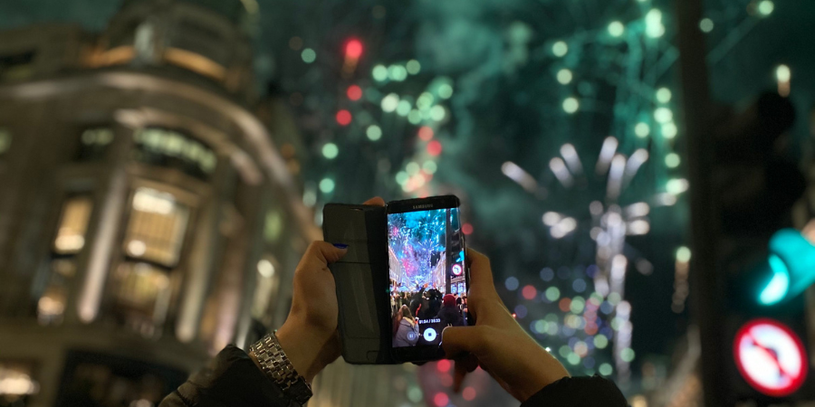 Someone taking a photo of London Fireworks