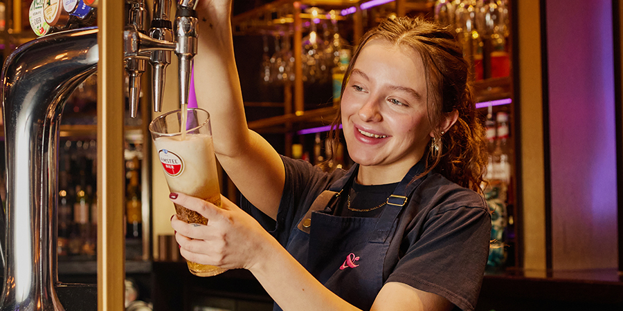Bar team member looking at the camera.