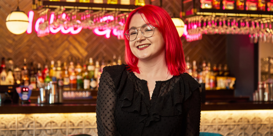 Deputy Manager at S&L smiling at camera