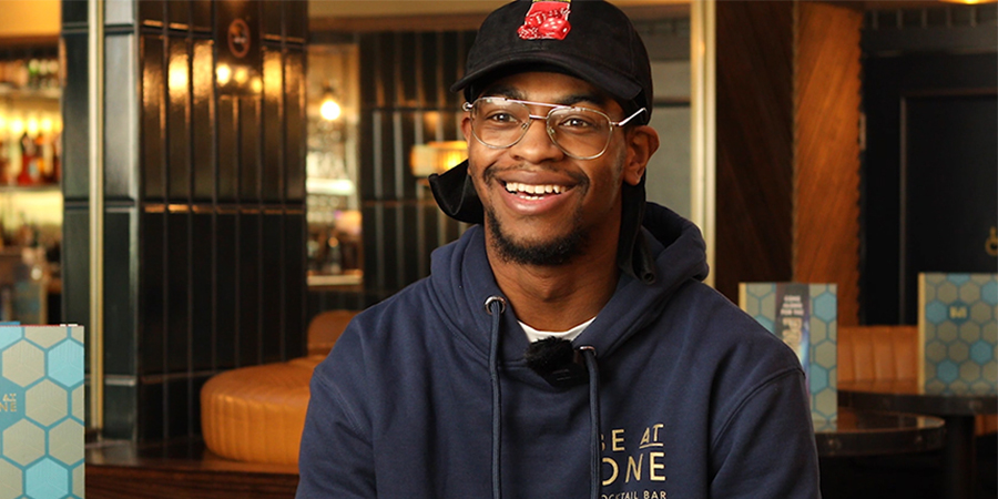 Be At One General Manager in Be At One hoody smiling at the camera.