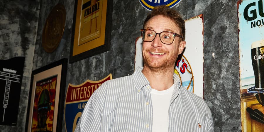 Rita's General Manager smiling off camera.