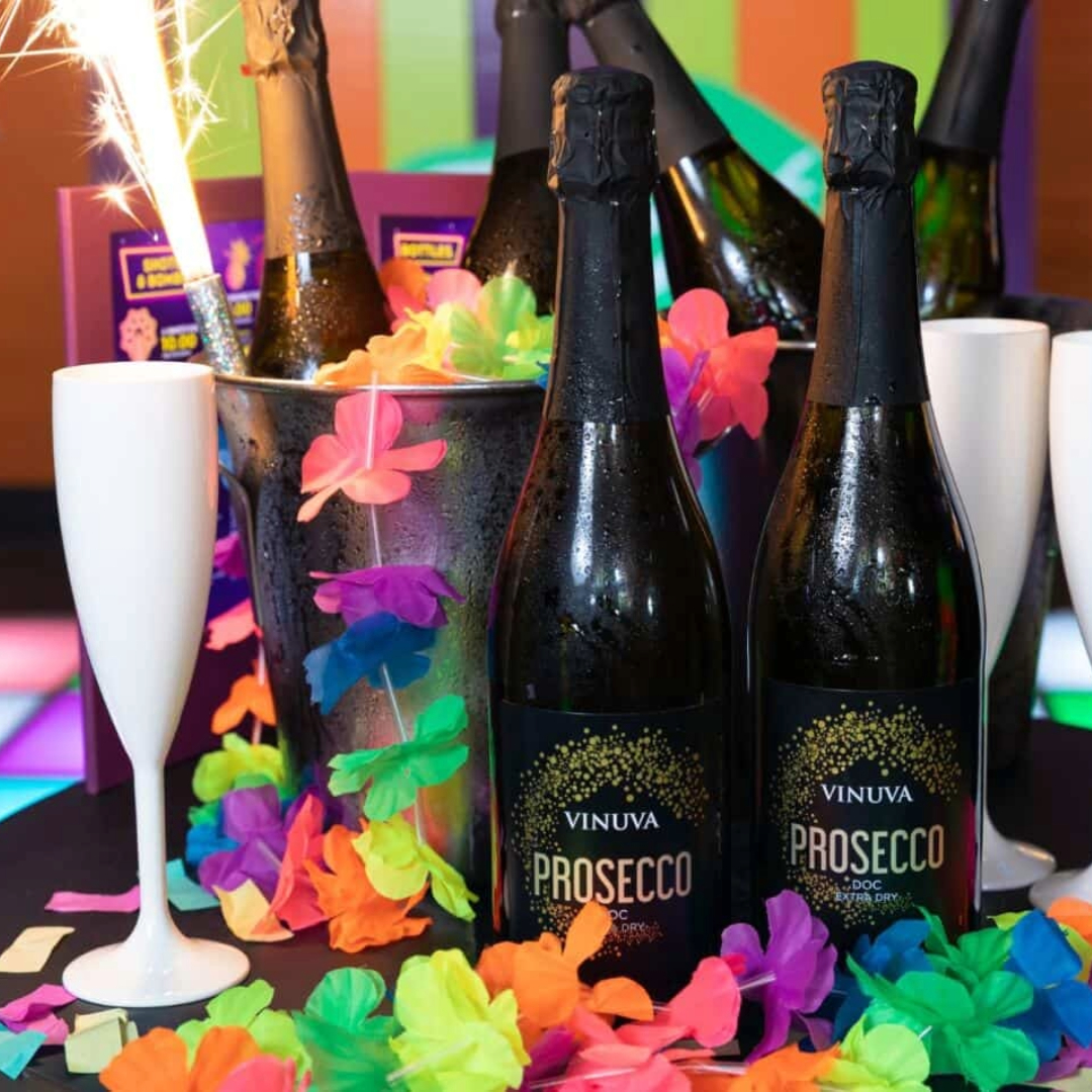 Two bottles of prosecco with sparklers
