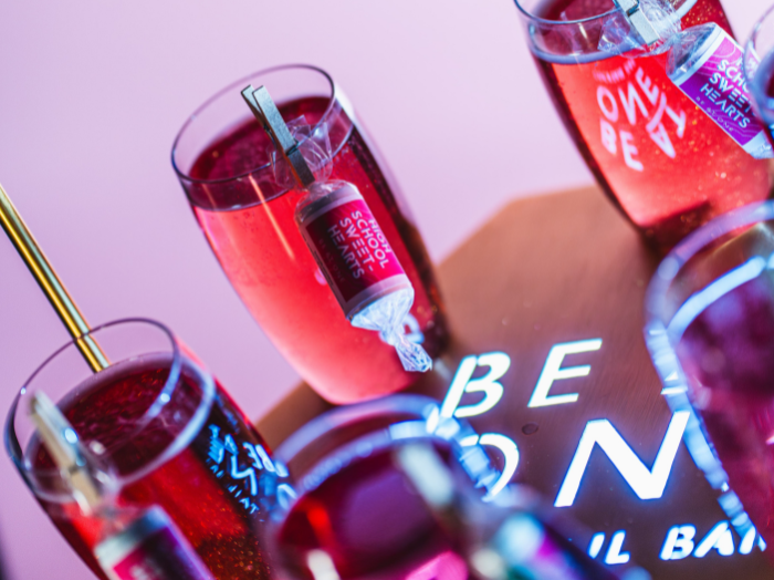 Bartender holding High School Sweethearts Cocktail