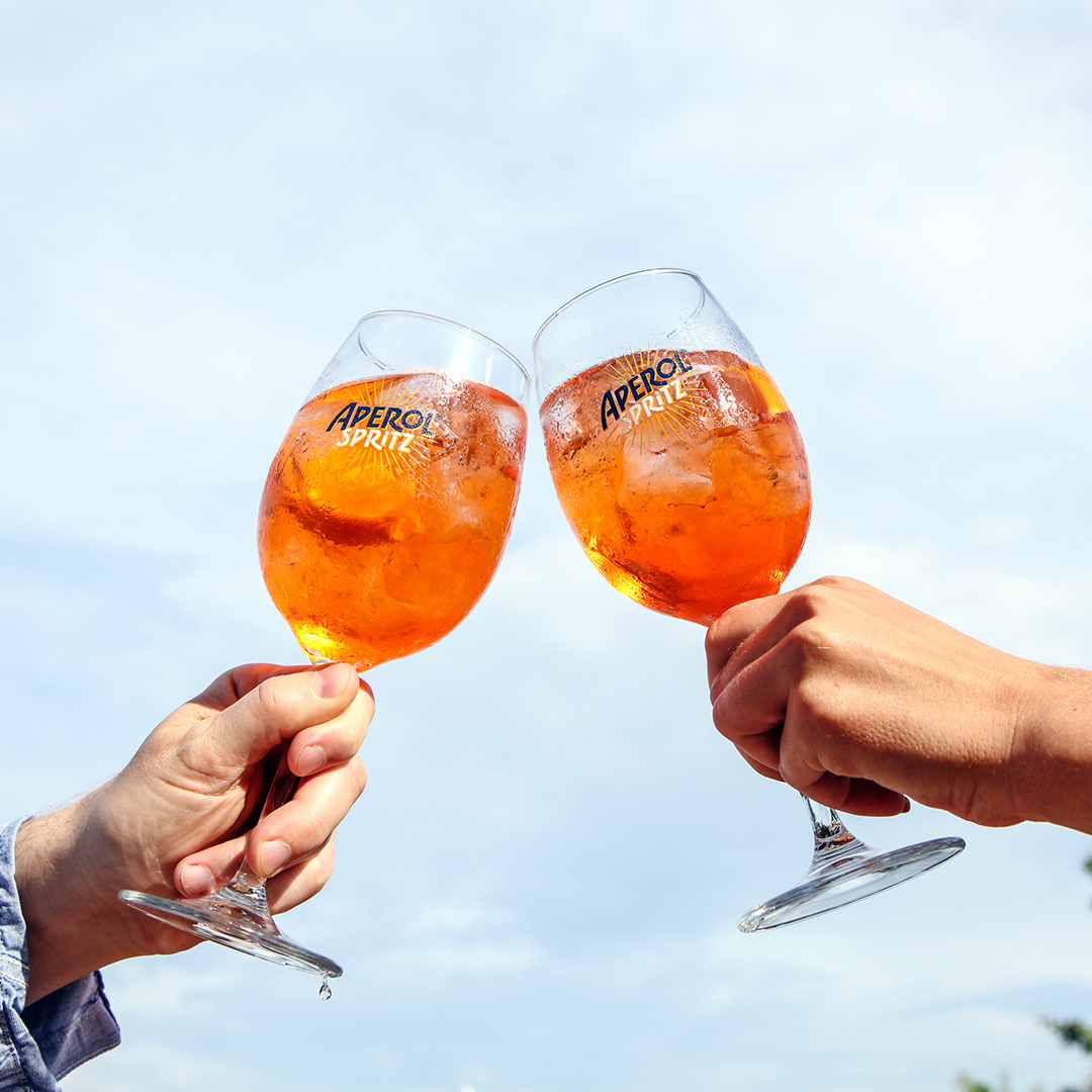 Toasting Aperol Spritz at S&L