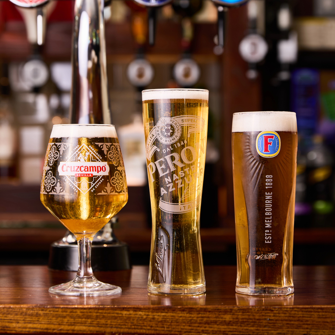 Three pints lined up on bar