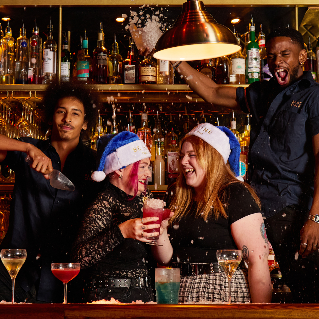 Girls mixing Christmas themed cocktails at Be At One Richmond