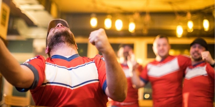 Friends Celebrating Watching Sport