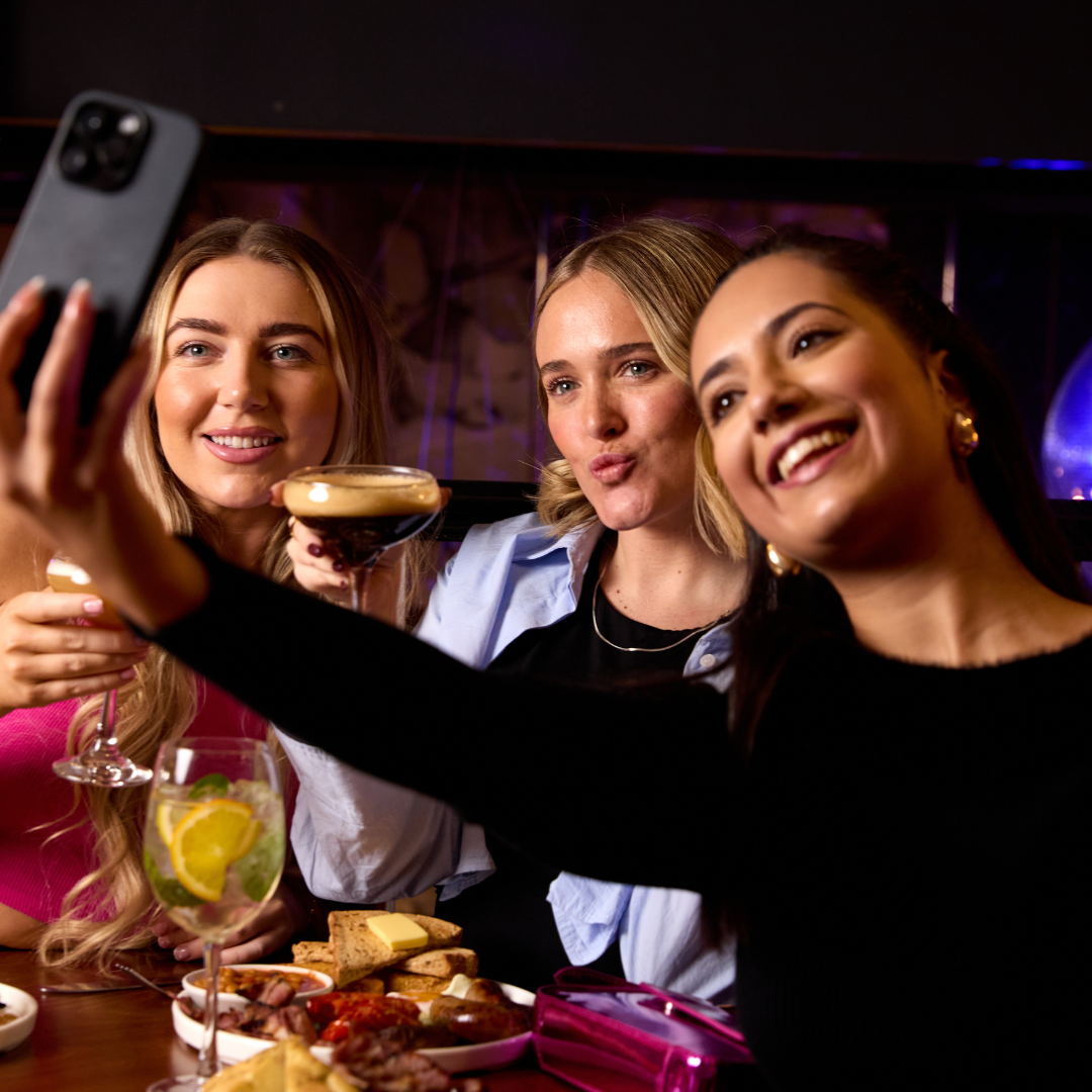 3 girls enjoying bottomless brunch at Slug & Lettuce