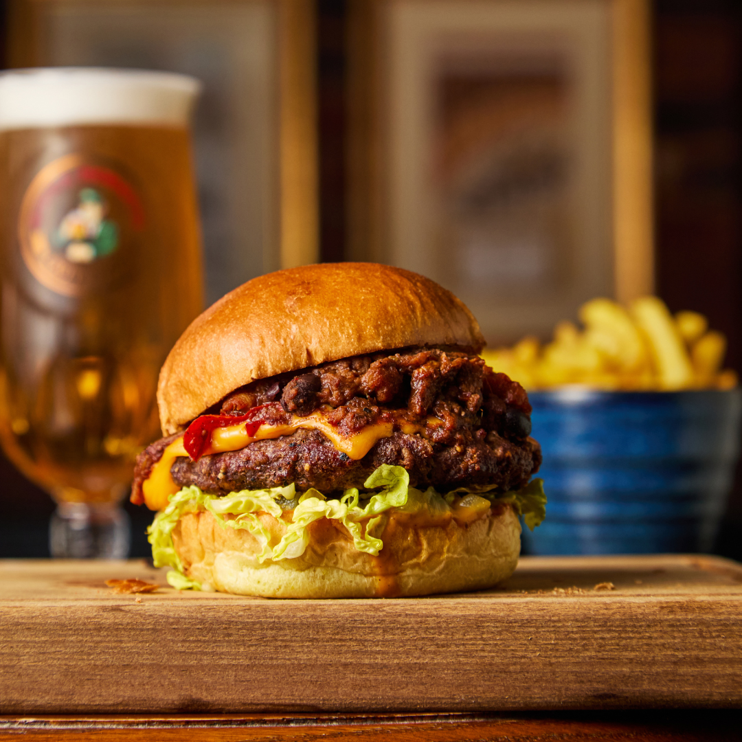 Burger and chips at Ye Olde Griffin Hotel March