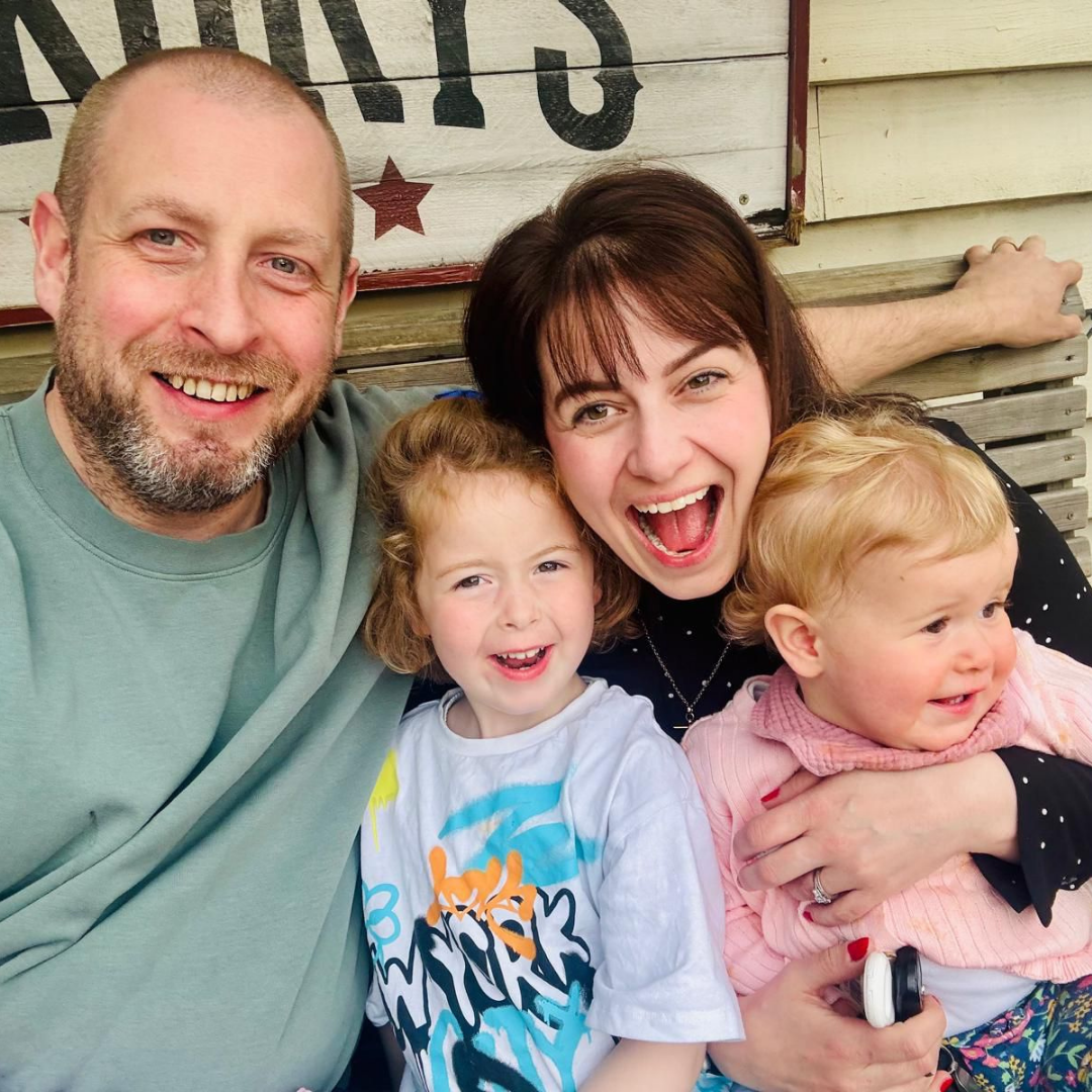 Image of Alex with his family