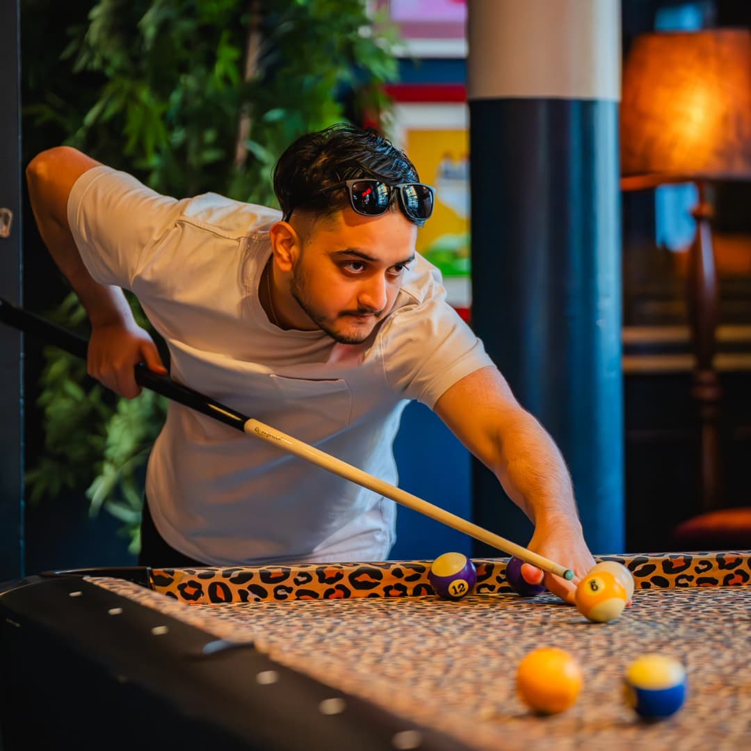 Leopard print pool tables at Rita's Leeds
