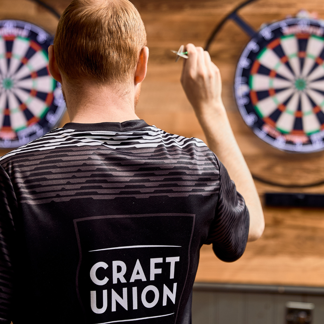 Man playing darts