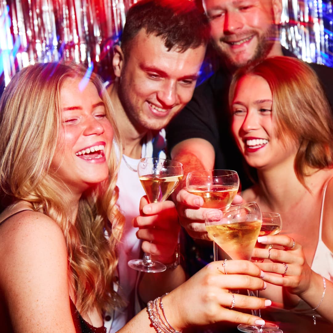 People enjoying Lanson Champagne at Be At One