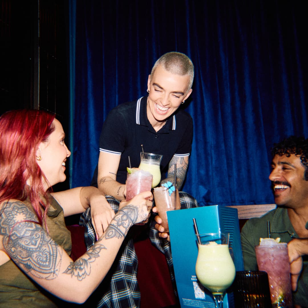 Group enjoying 2-4-1 cocktails at Be At One Bath