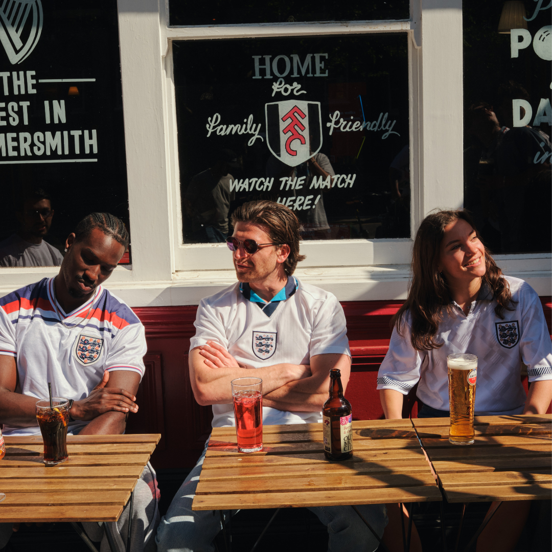 3 pints of peroni in a beer garden