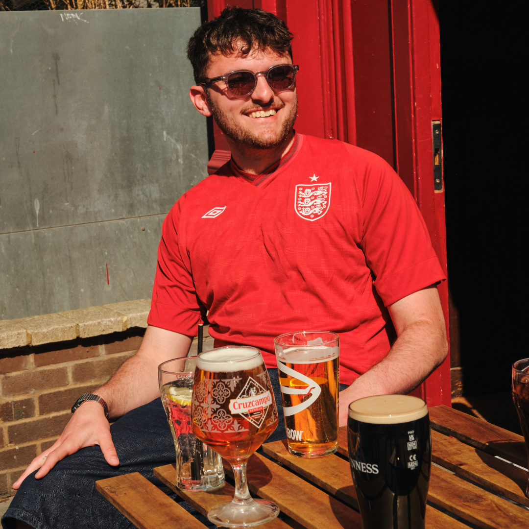 3 pints of peroni in a beer garden