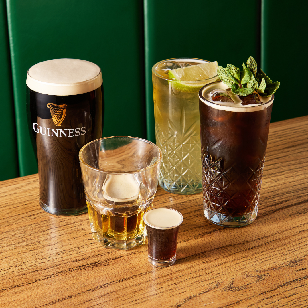 Cocktails and Guinness on table