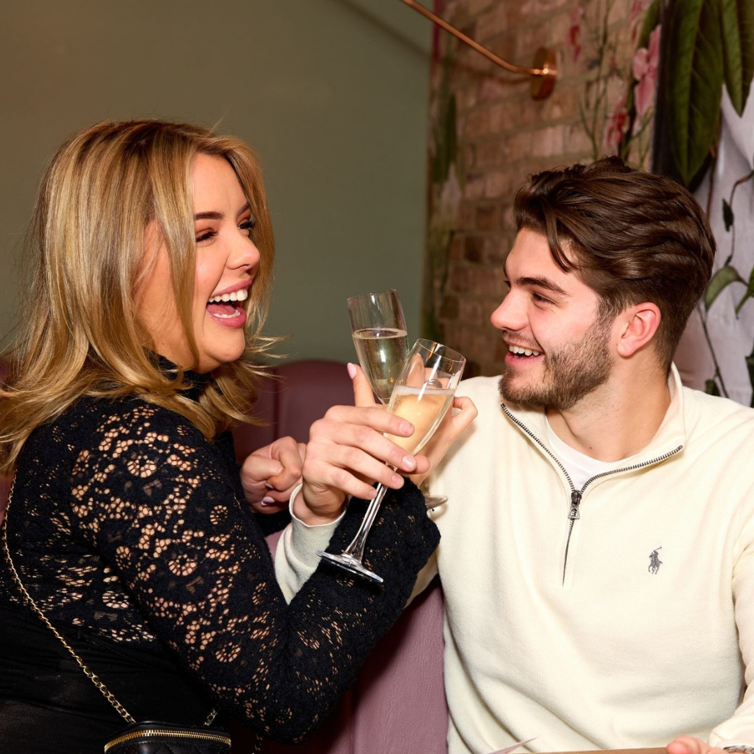 Couple toasting prosecco at Slug And Lettuce Bromsgrove