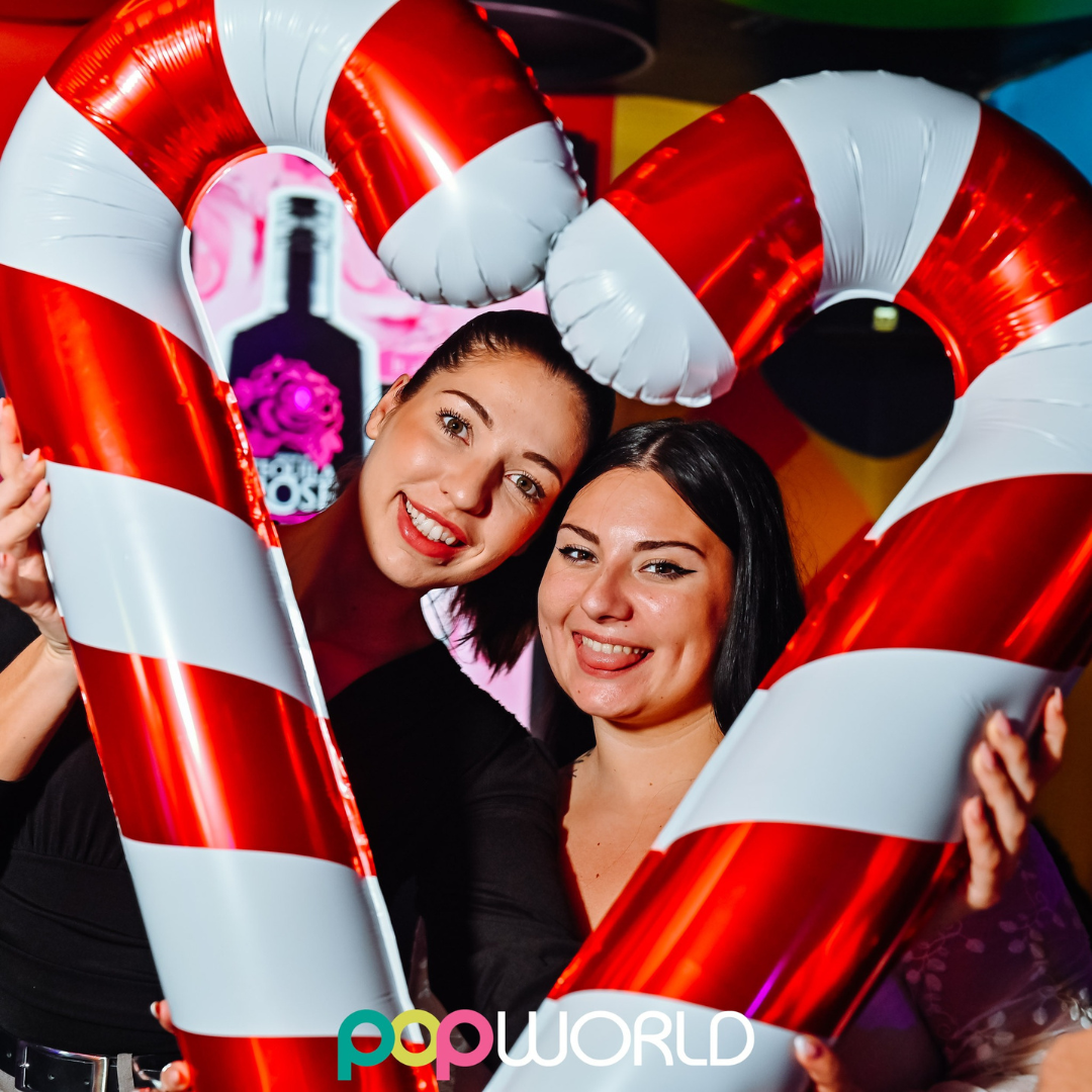 2 friends enjoying Christmas at Popworld Guildford