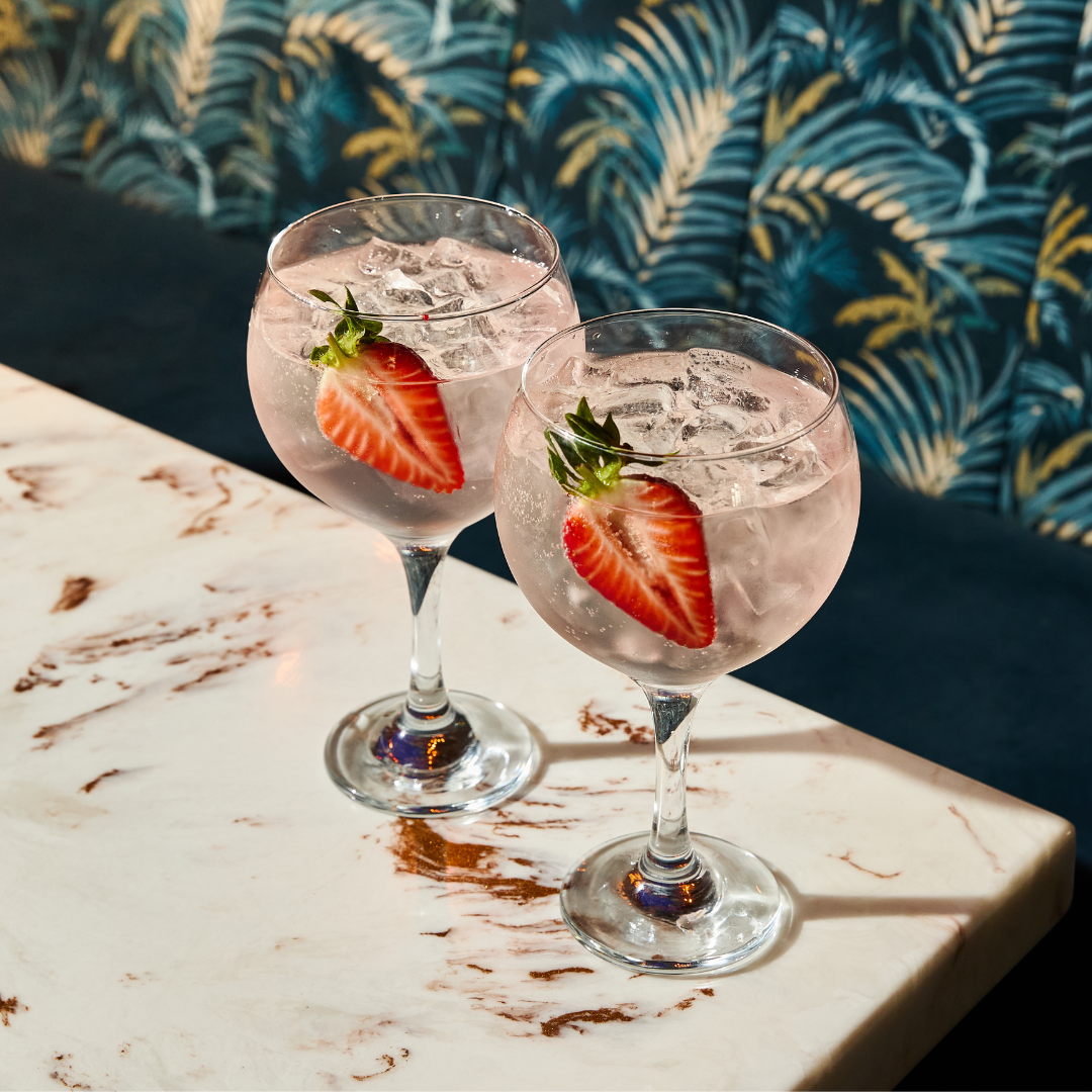 2 spritz cocktails on table