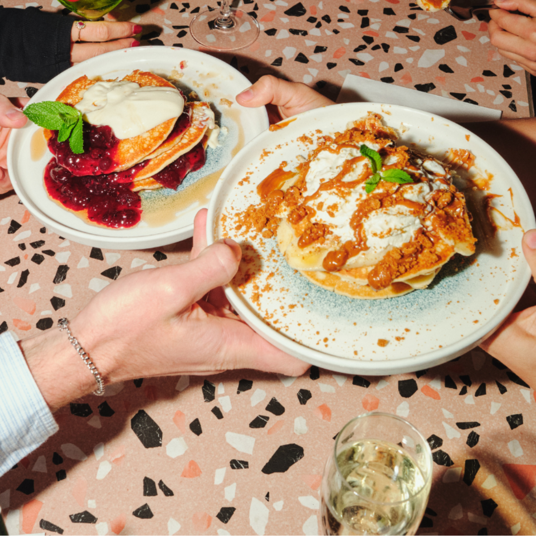 3 PEOPLE ENJOYING BOTTOMLESS BRUNCH