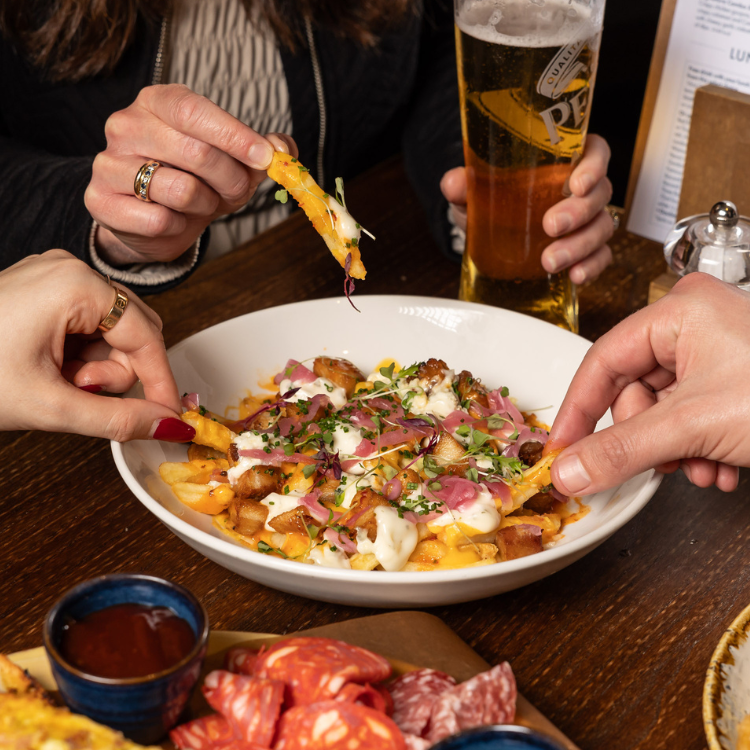Sharing Food in Tattershall Castle Whitehall Beer Garden