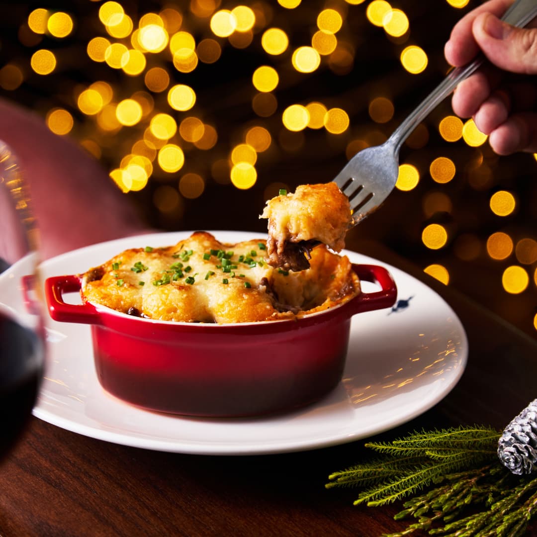 Fork Lifting Piece of Steak Pie