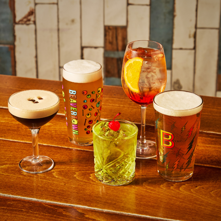 3 cocktails and 2 pints on table