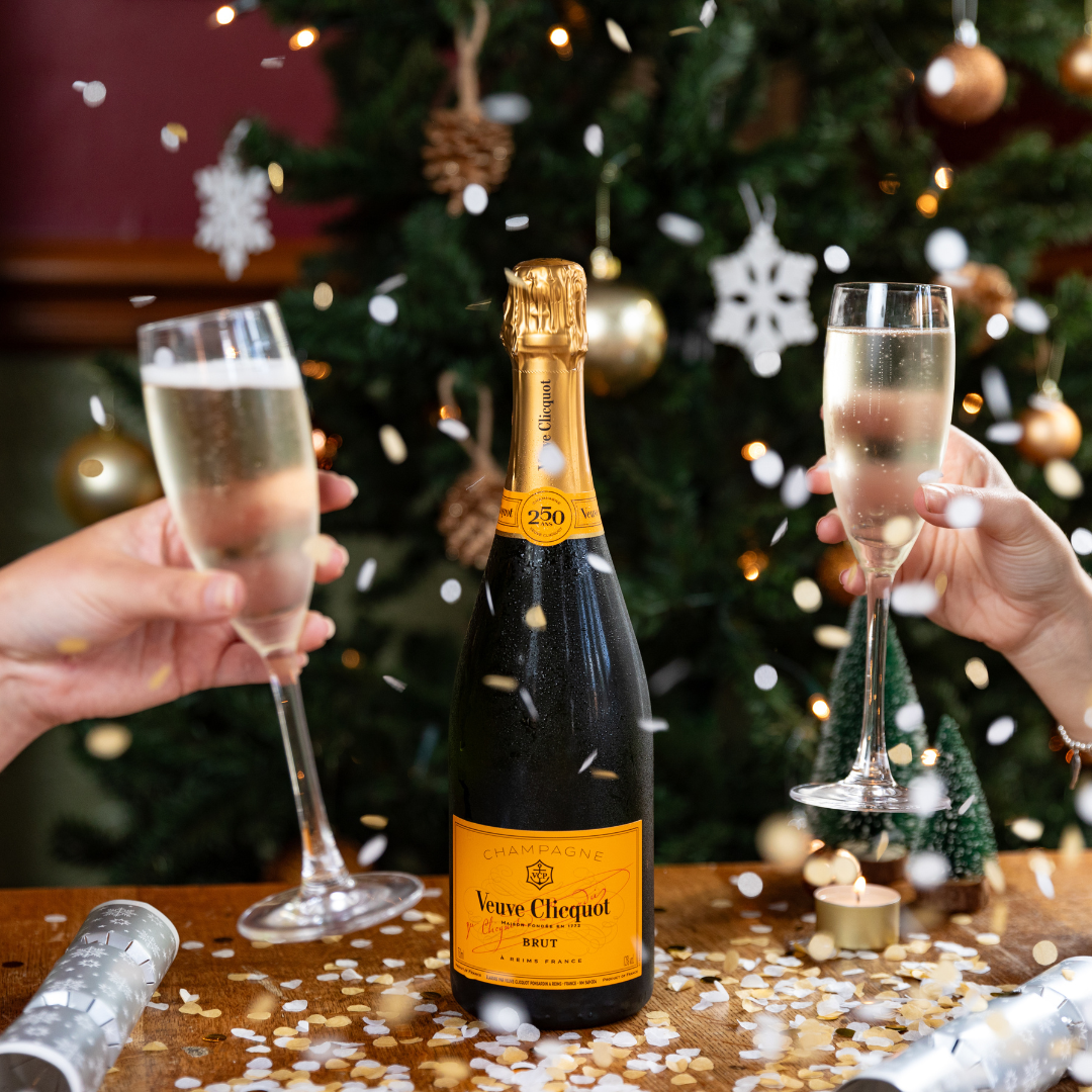 cheers prosecco glasses and bottle 