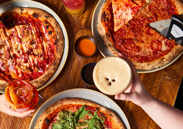 Three pizzas and cocktails