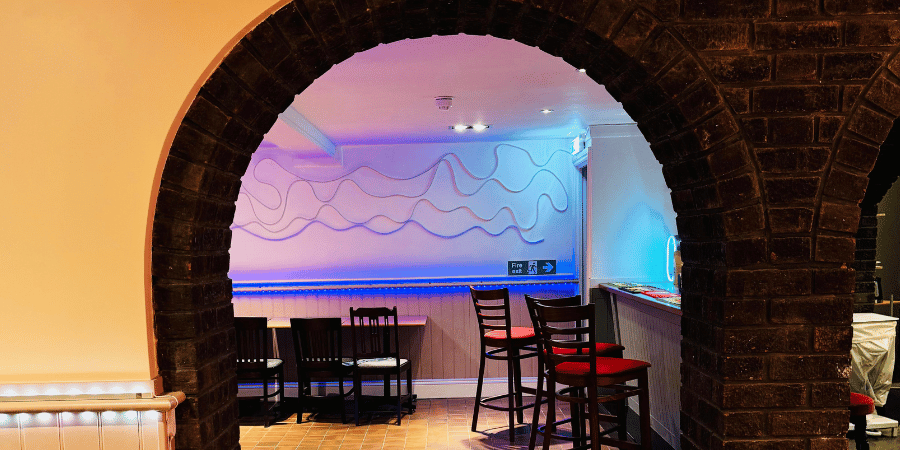 Private Hire in London | Arch in seating area