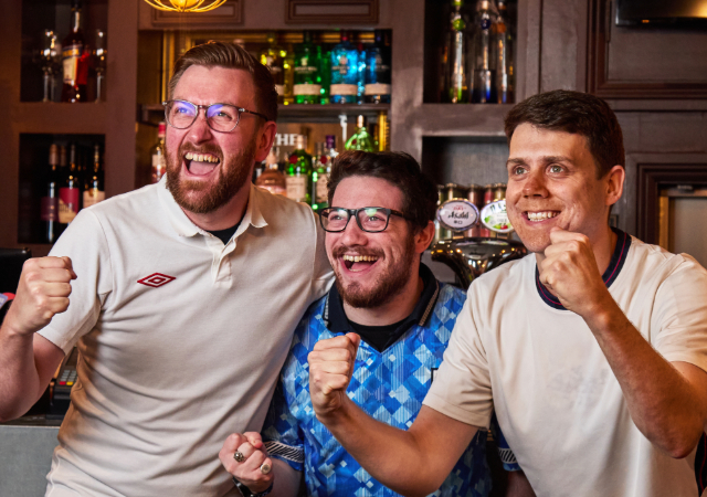 Fans celebrating at The People's Pub