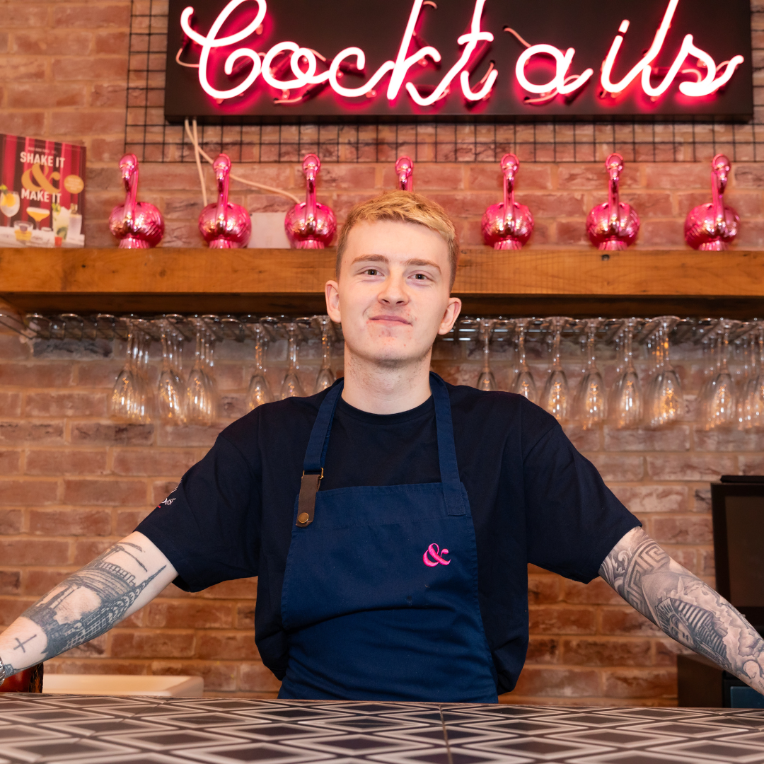 S&L team member smiling at camera