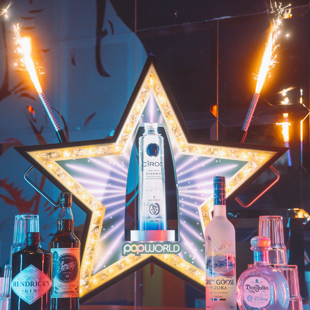 Popworld spirit bottle holder in the shape of a star
