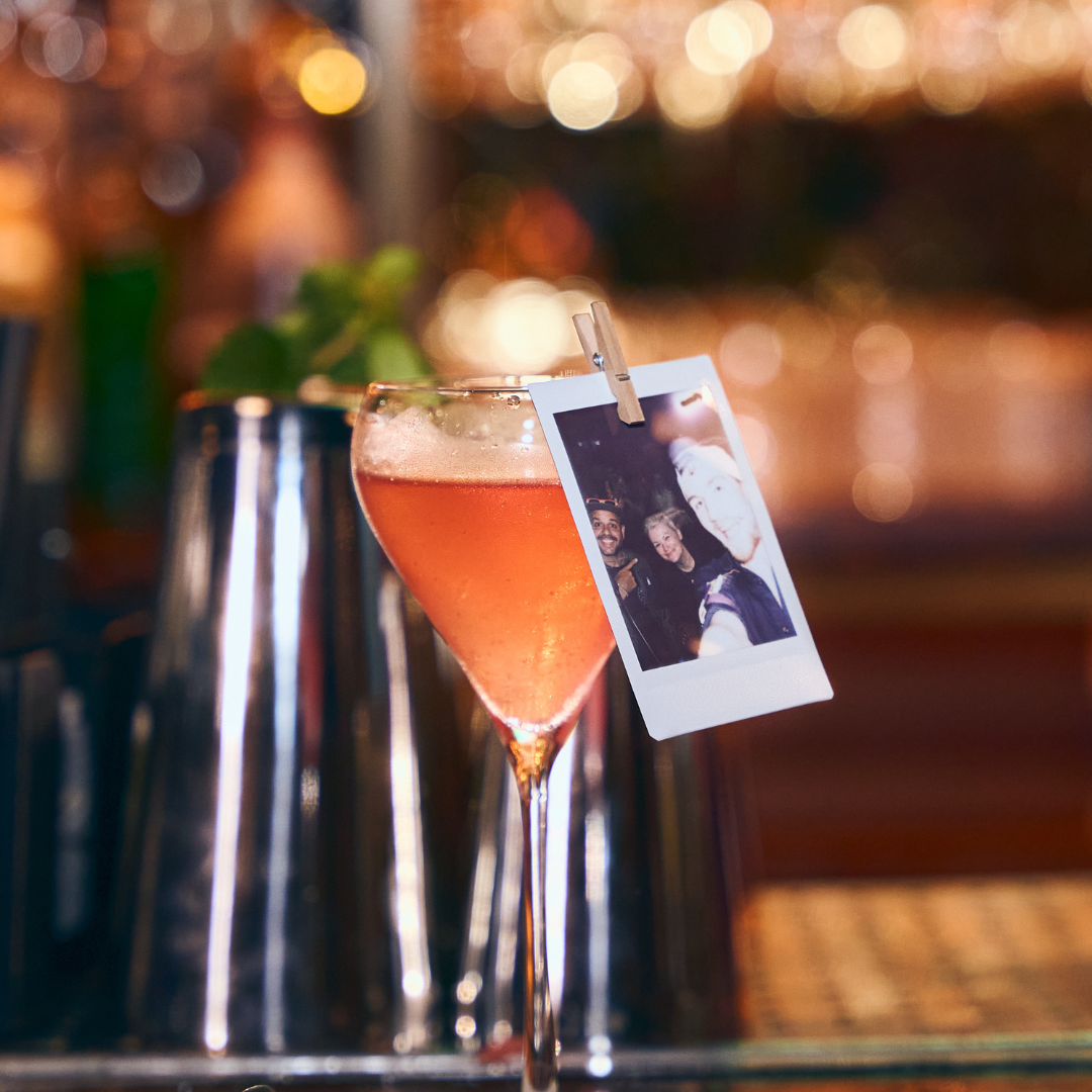 Be At One cocktail with polaroid picture attached
