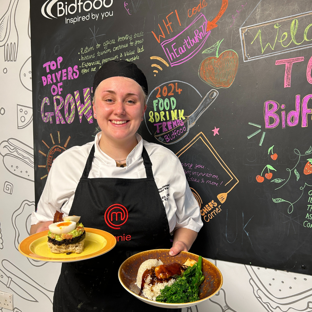 Masterchef finalist, Annie holding his two final dishes
