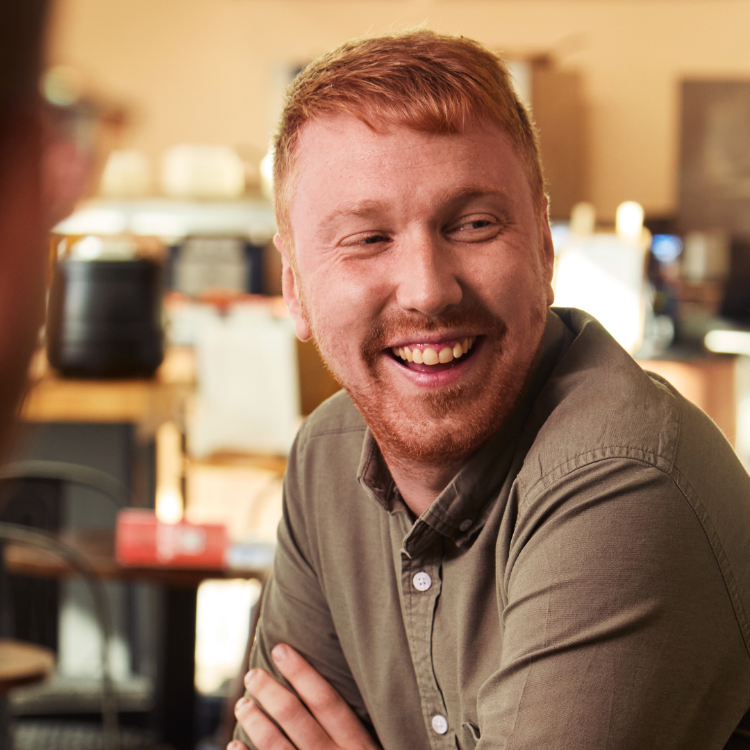 HR team member smiling towards the camera.