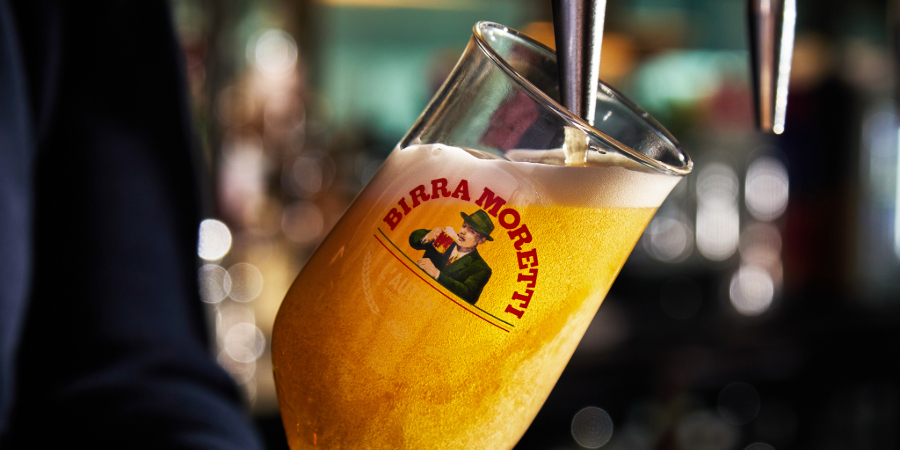 Pint of Birra Moretti being poured
